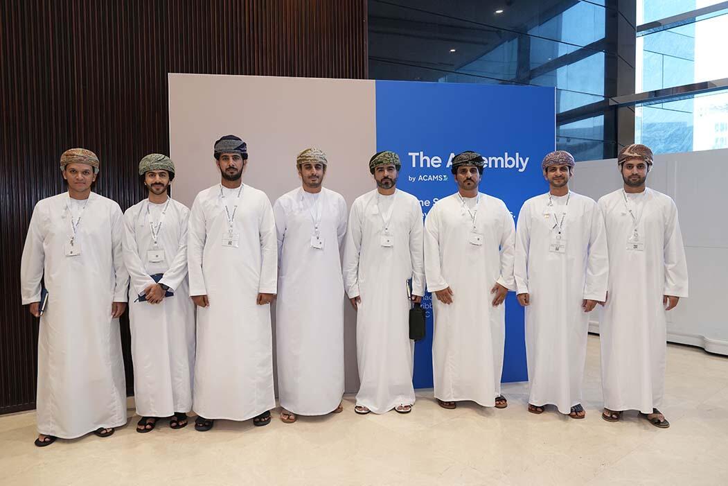A professional team in Dubai, showcasing unity and dedication in their diplomatic roles.